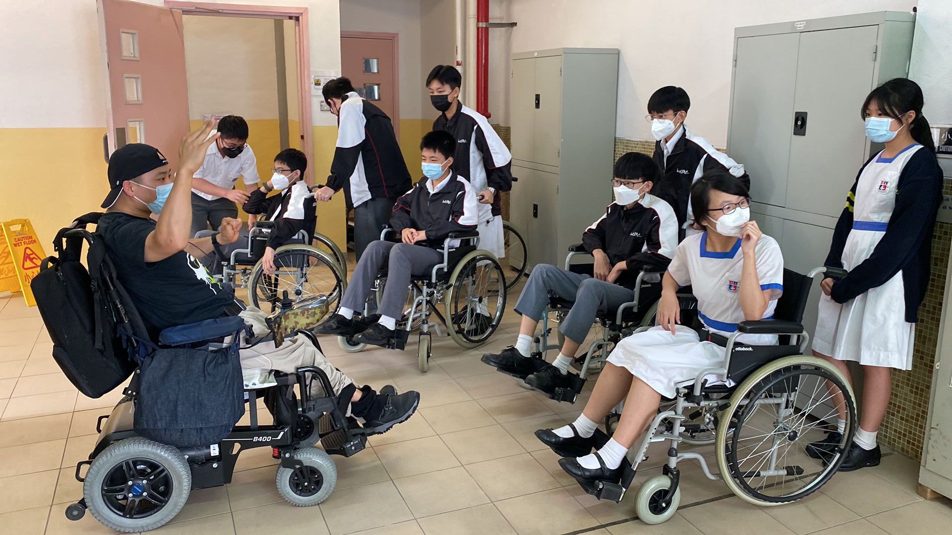 Students are being introduced to use a wheelchair by us.